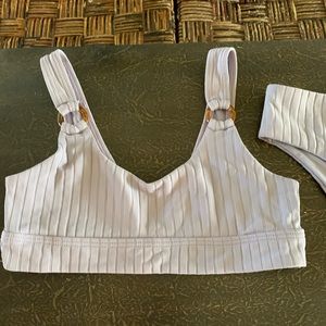 purple kids bikini. not worn much. clean from tillys. top can be worn either way